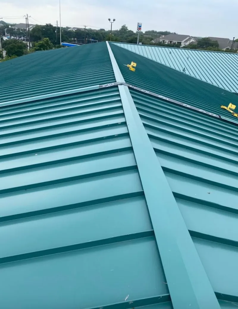 Green commercial metal roof ridge and valley for Metal Roof Repair in Grandville