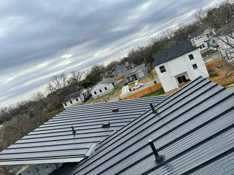 Standing seam metal roof panels with vents for Skylight Repair in Grandville